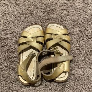 Gold flip flops
